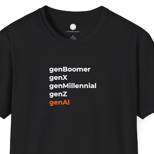 May include: Black crew neck t-shirt with white text: genBoomer, genX, genMillennial, genZ, and genAI in orange. The shirt is made of a soft material.
