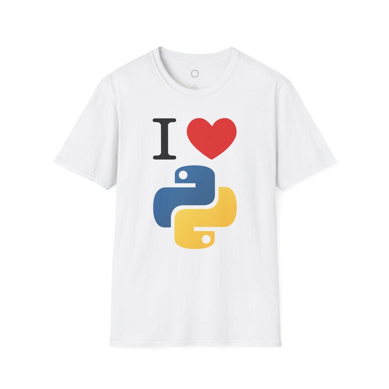 May include: White t-shirt with the text "I &hearts; Python". The design features a black "I", a red heart, and a blue and yellow Python logo. The shirt is made of a soft material and has a crew neck.