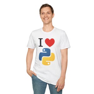 May include: White t-shirt with the text "I &hearts; Python" in black and red, featuring the Python programming language logo in blue and yellow. The shirt is made of a soft material.