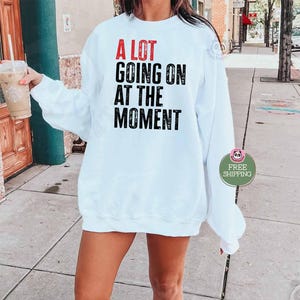 white color swift concert sweatshirt "A Lot Going on at the moment" sweatshirt music concert sweatshirt and hoodie eras tour concert sweater