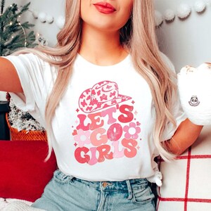 Let&#39;s Go Girls Shirt, Retro Cowgirl T-Shirt, Western Girls Trip shirt, Howdy shirt, Country Bachelorette Party, Pink Leopard Cowboy Hat Tee