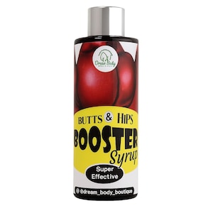 May include: A black bottle with a silver cap, labeled "BUTTS & HIPS BOOSTER Syrup." The label features a graphic of a red shape and the text "Super Effective." The brand name "Orean Body" is also visible.