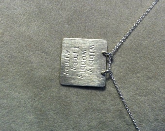 Doctor Who "wibbly wobbly timey wimey" necklace-- geek girl collection -- sterling silver