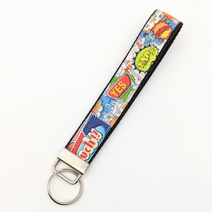 Custom Ribbon Key Fob / Key Chain Holder You pick the design Comic Book Hero