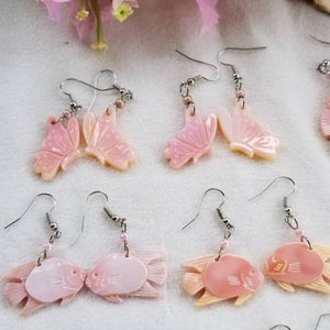 conch shell earrings or pendant