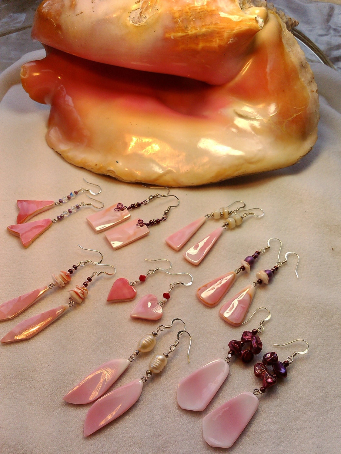 Beautiful earrings carved out of the conch shell from ...