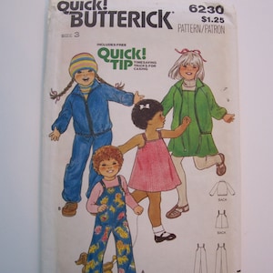 May include: A sewing pattern for children's clothing. The pattern includes instructions for making a blue jacket, a pink dress, and a pair of overalls. The pattern is from Butterick and is number 6230. The pattern is for size 3.