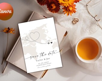 May include: Save the date card with a world map illustration and a heart drawn over the map. The text reads "Save the date, Taylor & Joe, 31.08.2025,  Say "I do" in beautiful Bali,  Love and blessings to follow."