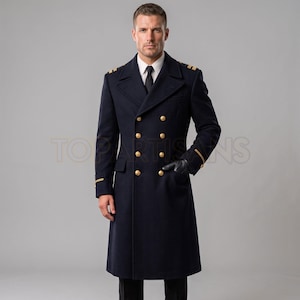 May include: A navy blue double-breasted wool coat featuring gold-toned buttons, wide lapels, and gold-colored stripes on the cuffs and shoulders. The coat is worn over a white collared shirt with a black tie and includes black leather gloves.