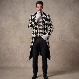 May include: A long-tailed coat and matching waistcoat featuring a black and white diamond harlequin pattern, worn with a white dress shirt, a black bow tie, white gloves, and solid black trousers. The ensemble is formal and structured in its design.