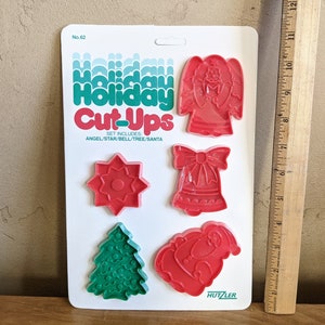 Holiday Cut-Ups, Hutzler Cookie Cutters, 5 Plastic Cutters in Original 1981 Packaging, Angel, Star, Bell, Tree, Santa
