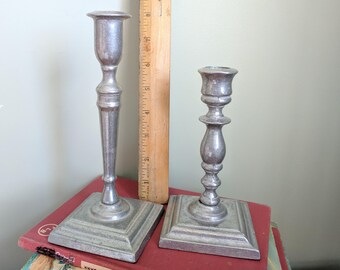 Two Silver Colored Candlesticks, 6 and 7.75 Inches Tall, Weigh 14.8 oz together