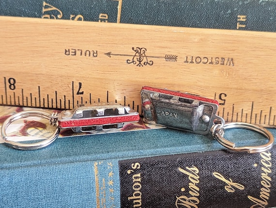 Two Tiny Harmonica Keychains, One Inch Harmonicas… - image 1