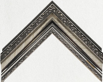 Marco adornado de peltre plateado