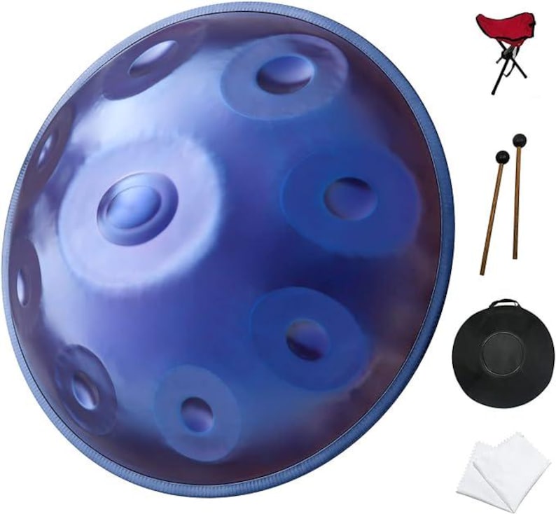 May include: A blue handpan with multiple circular sound holes. Accessories include a red folding stool, two wooden mallets with black heads, a black carrying case, and two white cleaning cloths. The handpan has a metallic sheen.