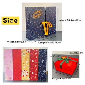 May include: A navy blue Christmas advent calendar with gold text reading "Merry Christmas". The calendar is 12 inches tall, 12.9 inches long, and 3.1 inches wide. Also shown is a red gift box with a green ribbon, 5.7 inches long, 5.7 inches wide, and 2.7 inches tall.
