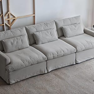 Light gray customized sofa cover, full set sofa cover, color customized size sofa cover, dust-proof sofa cover.