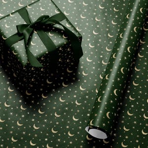 Gold celestial wrapping paper perfect for Christmas or birthdays
