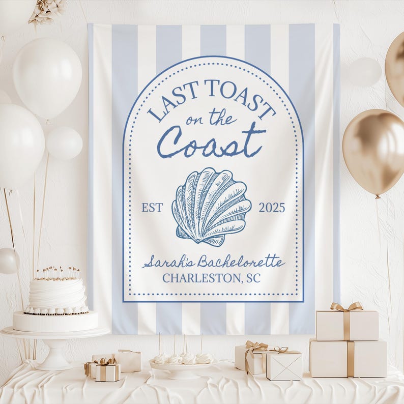 Blue and white striped welcome sign backdrop in a "Last Toast On The Coast" theme. Perfect for a coastal bachelorette party or bridal shower. The welcome sign is surrounded by beige and white balloons arranged in clusters for festive green ogre themed decorations or photo backdrop.