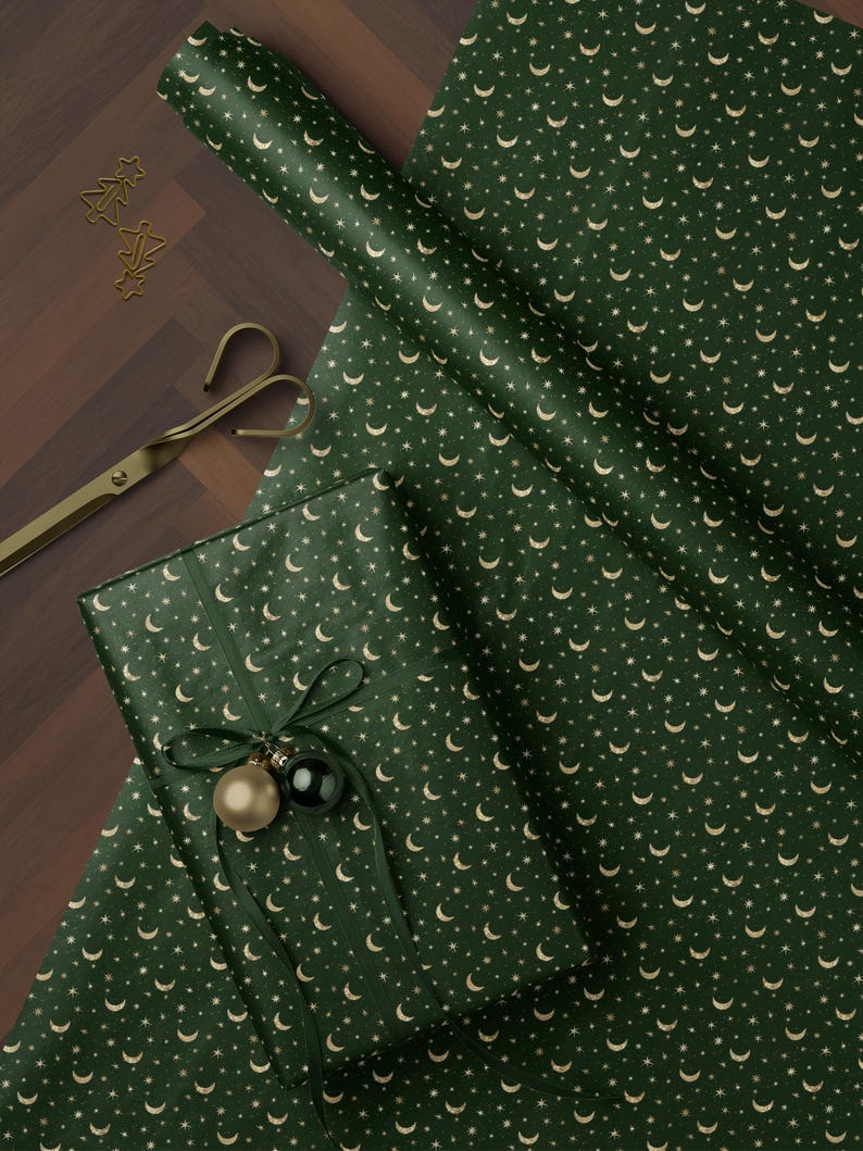 Moon and star Christmas wrapping paper in dark green luxury style