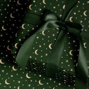 Elegant dark green gold celestial wrapping paper for holiday gifts