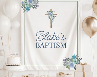 May include: White backdrop with a green border, featuring a watercolor cross with blue flowers and the text "Blake's Baptism".