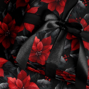 May include: A wrapped gift with a black satin bow. The wrapping paper features a pattern of red poinsettias and gray leaves on a black background. Red berries are scattered throughout the design.