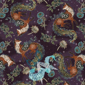 May include: A dark purple fabric featuring a repeating pattern of orange foxes with white chests and leafy tails. The foxes are surrounded by teal flowers, dark berries, and white stars. A light blue banner with the text FUSSY CUTS CUSTOM FABRIC is visible.