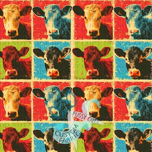 May include: A colorful fabric pattern featuring a grid of cow faces in various colors. Each cow is set against a different background color, including red, blue, and green. The words "DO NOT COPY" are visible in the background.