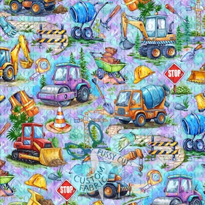 May include: A colorful fabric pattern featuring construction vehicles and tools. The design includes excavators, cement mixers, wheelbarrows, and stop signs, set against a pastel background. The text "Fussy Cuts" and "Custom Fabric" are also visible.