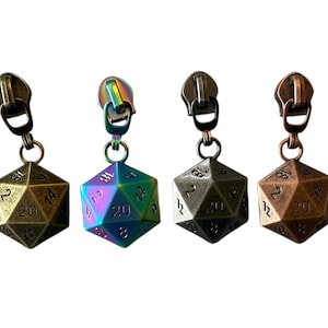 May include: Four metal D20 dice zipper pulls in bronze, iridescent, dark grey, and copper. Each die is attached to a zipper pull with a small ring. The dice are numbered with the numbers 1-20.