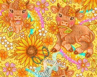 May include: A repeating pattern featuring cartoon cows with flower crowns, surrounded by sunflowers and other flowers in shades of orange, pink, and white, set against a yellow background. The text "FUSSY CUTS CUSTOM FABRIC" is visible.