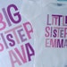 Kelsey Merwin reviewed Big Sister Little Sister Shirt set of 2, Sibling Shirt, Personalized Tshirt with Pink and Purple Letters (12082011d)