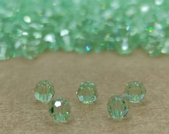 Swarovski Chrysolite Crystal Beads: Round Faceted Green Beads