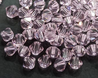 Cuentas bicónicas de cristal Swarovski Rosaline: Cuentas prismáticas de color rosa claro
