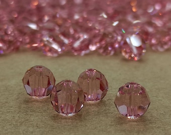 Perline rotonde di cristallo Swarovski color rosa chiaro, sfaccettate da 4-8 mm, ideali per la creazione di gioielli.