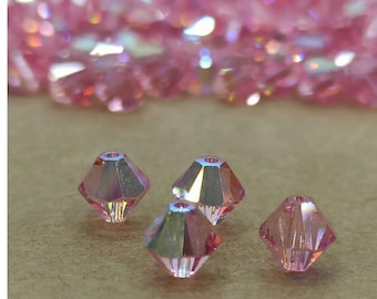 Perlas bicono de cristal Swarovski Light Rose AB (6 mm)
