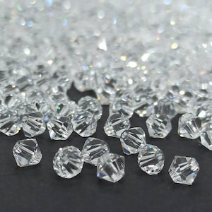 Cuentas bicono de cristal Swarovski: cristales transparentes de 8 mm para bodas.