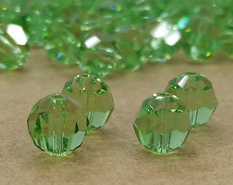 Swarovski Peridot Crystal Beads: 8mm Round Cut