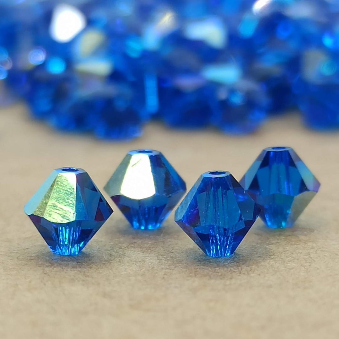 Swarovski Capri Blue AB Crystal Bicone Beads, 5301/5328 Cut