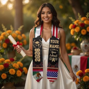 May include: A woman wearing a white dress and graduation sash with the text "YOUR NAME" and "You School". The sash has the year "2026" and a graduation cap graphic. The sash features the Mexican and American flags. She holds a diploma.