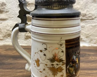ピューター製の蓋が付いたクリスタルガラス製のビールジョッキ。RASTAL
