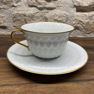 Limoges porcelain teacup and saucer – A. Vignaud for Limoges UNIC Paris – Gold rim