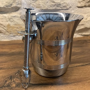Small silver metal ice bucket with vintage tongs