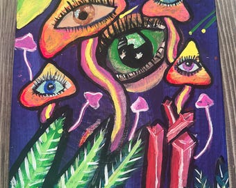 Puede incluir: Una pintura psicodélica con setas coloridas con ojos, sobre un fondo azul oscuro con estrellas y una luna creciente. Las setas tienen tallos y sombreros de color naranja brillante, amarillo y rosa, con ojos verdes, azules y morados. La pintura tiene un estilo caprichoso y surrealista.