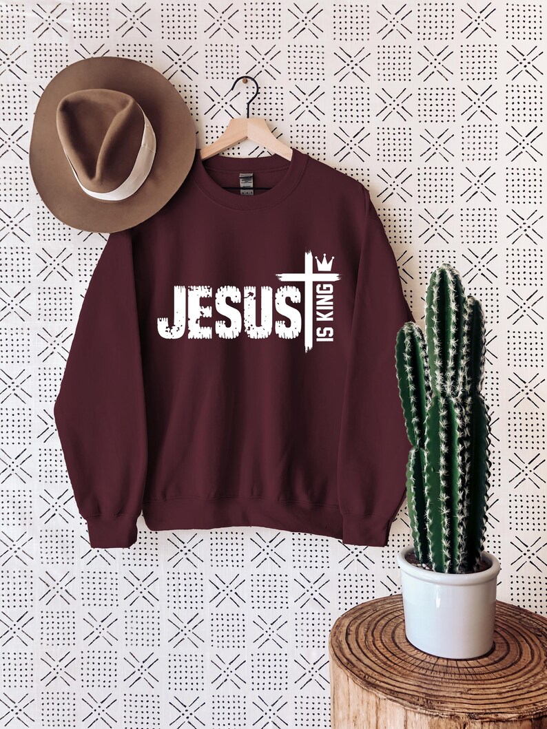 Jesus is King Shirt Jesus is King Tshirt Christian Merch Bible Verse Shirt Christian Streetwear Faith Based Apparel Religious Apparel GiftsJesus is King shirt
Christian streetwear shirt
Bible verse apparel
Faith based clothing
Religious gift for Christians
Christian merch tshirt
Jesus is King clothing