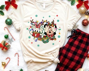 Minnie Daisy Christmas Shirt, Disney Girls Trip Xmas Shirt, Disneyland Christmas T-Shirt, Daisy Duck Christmas Sweatshirt, Disney Bestie Tee