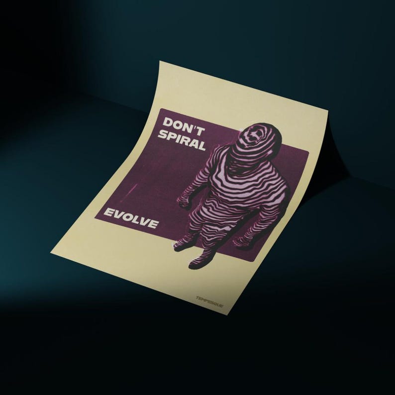 May include: A poster with a figure in a zebra-like pattern, with the words "DON'T SPIRAL" and "EVOLVE" in a dark purple rectangle. The poster is on a light yellow background.