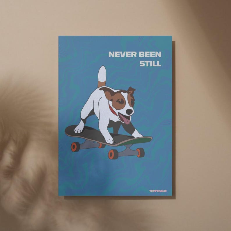 May include: A poster featuring a Jack Russell Terrier on a skateboard. The dog is white and brown with a red collar. The poster has the text "NEVER BEEN STILL" in white letters on a blue background with a swirl pattern. The skateboard has orange wheels.