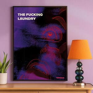 Poster with a moody purple and black background featuring a red neon-style outline of a distressed face and the text ‘THE FUCKING LAUNDRY’ in bold white letters. Modern, relatable, humorous Gen Z wall art.